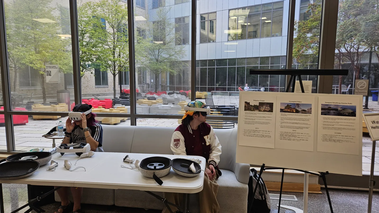 2 students wearing virtual reality headsets