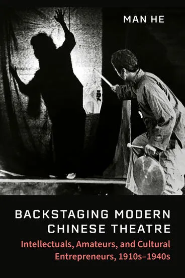  A person holds a drum and stick, facing a shadow figure behind a curtain. Book title: "Backstaging Modern Chinese Theatre" by Man He. 